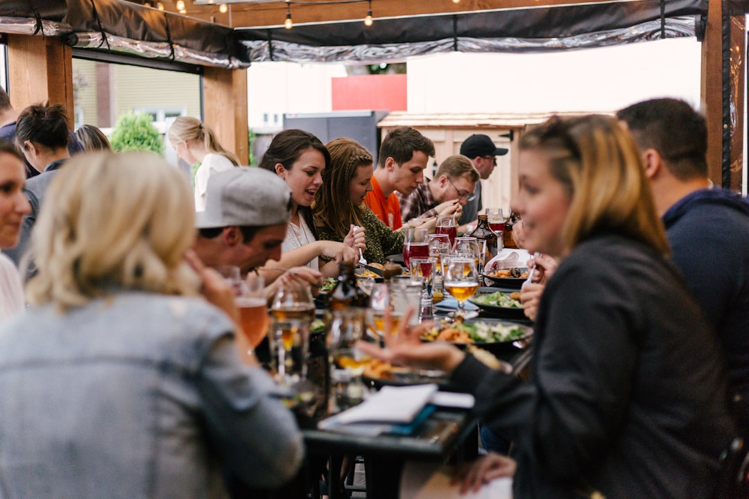 Friends dining together in a modern hospitality setting